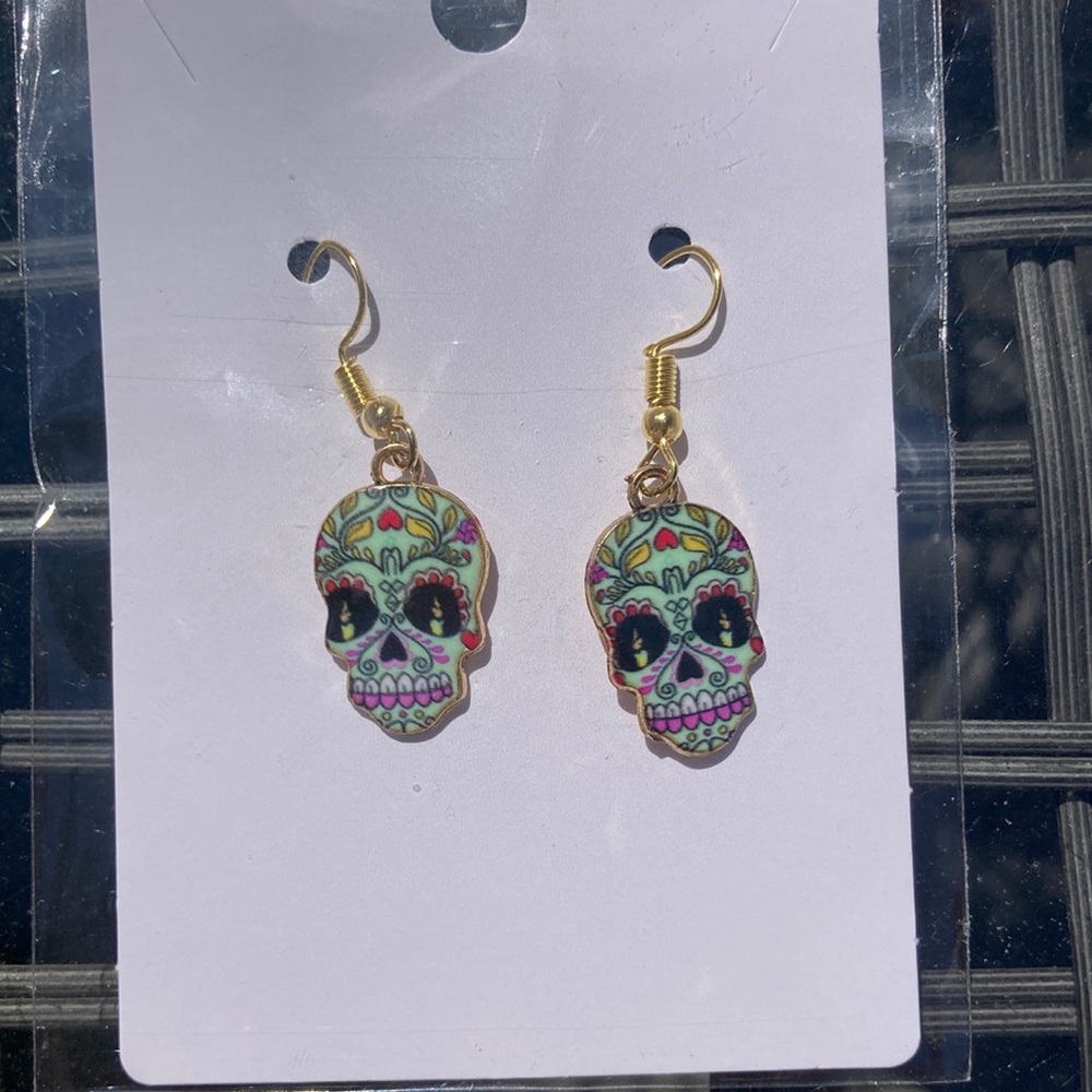 42.  “Sugar Skull” earrings.